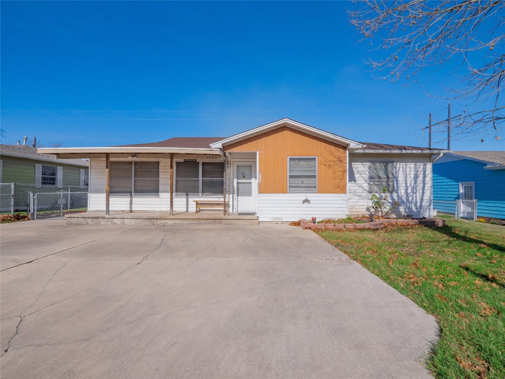 1409 Zephyr Road Killeen, TX 76541 - Photo 1 of 31 a front view of a house with a garden and yard