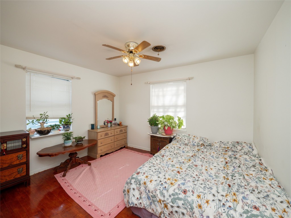 1409 Zephyr Road Killeen, TX 76541 - Photo 19 of 31 a living room with furniture flowerpot and a chandelier