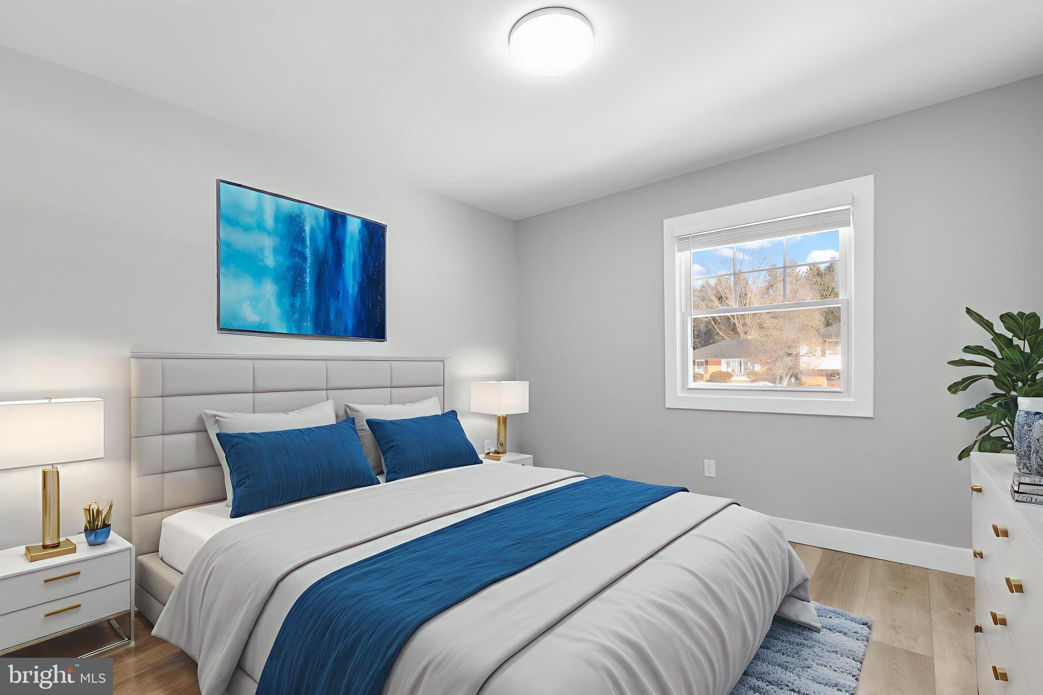 19104 Bloomfield Road Olney, MD 20832 - Photo 12 of 37 a bedroom with a bed and a window