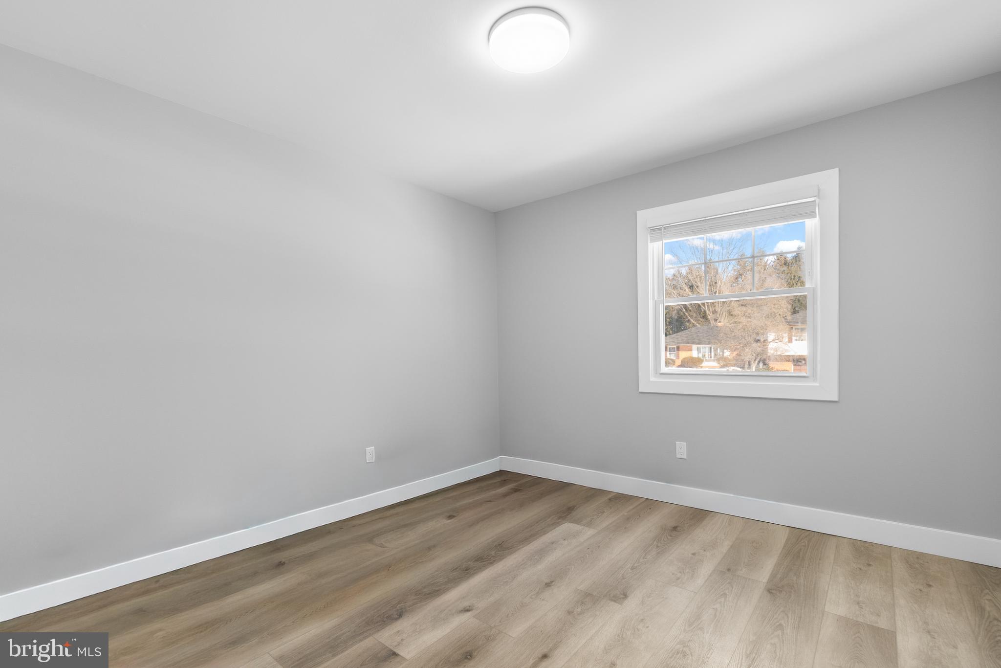 19104 Bloomfield Road Olney, MD 20832 - Photo 13 of 37 an empty room with a window