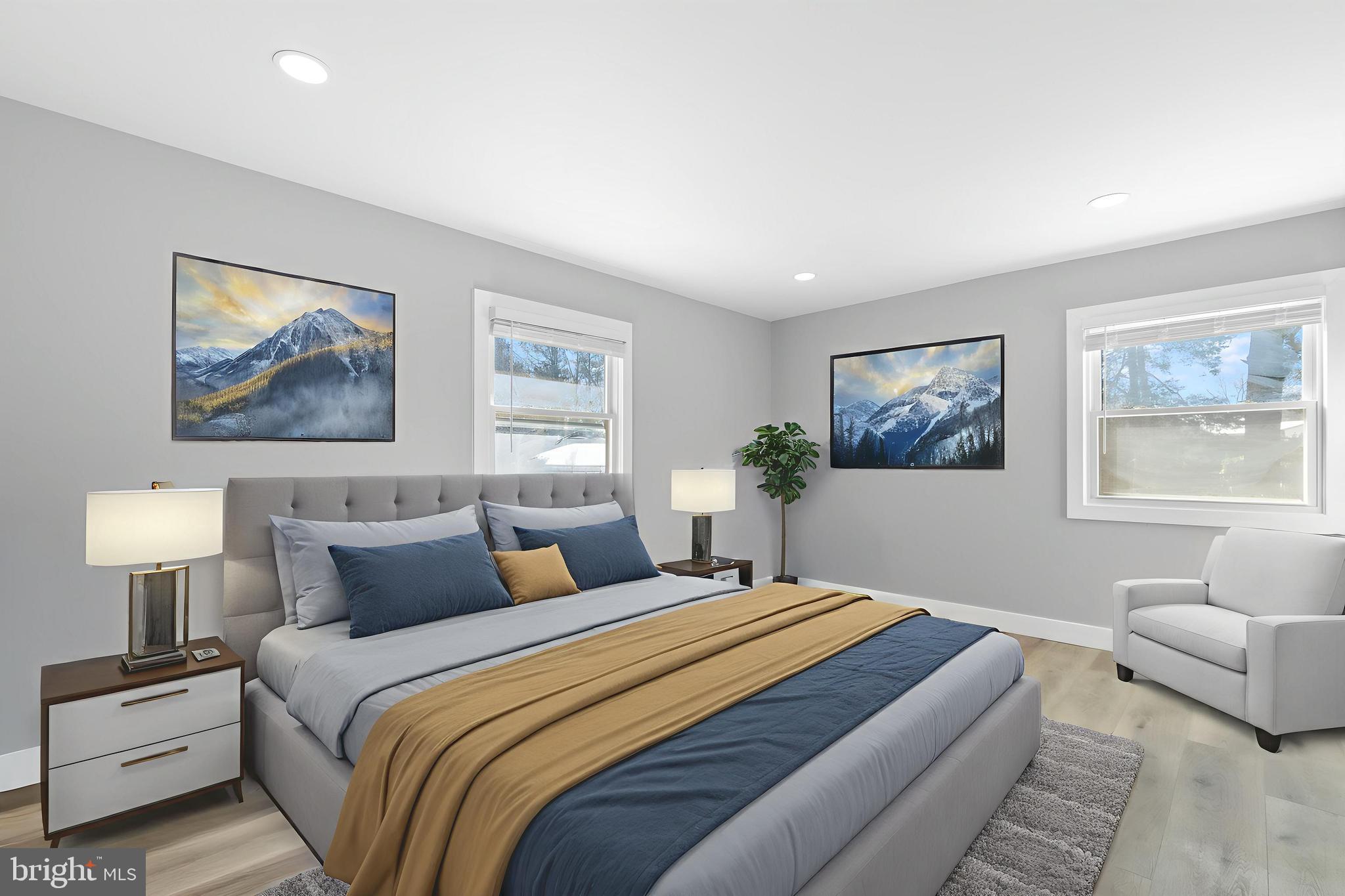 19104 Bloomfield Road Olney, MD 20832 - Photo 18 of 37 a bedroom with a large bed and a couch