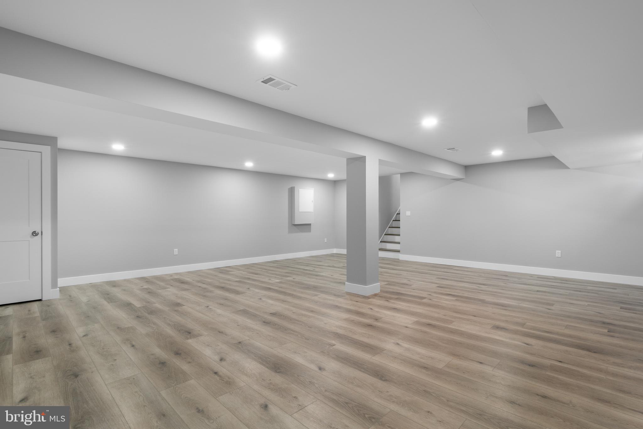 19104 Bloomfield Road Olney, MD 20832 - Photo 30 of 37 a view of an empty room with wooden floor