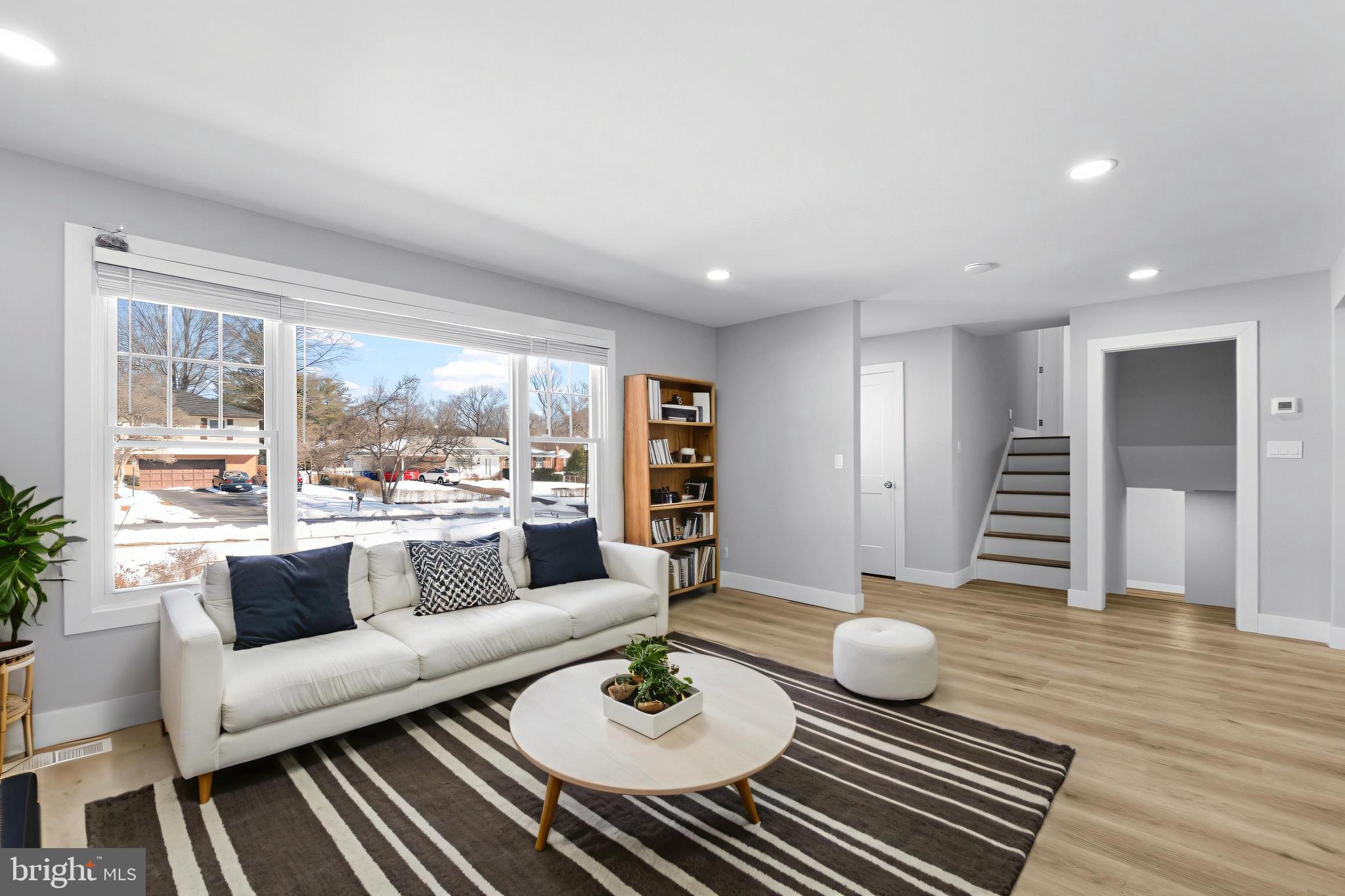 19104 Bloomfield Road Olney, MD 20832 - Photo 3 of 37 a living room with furniture and a wooden floor