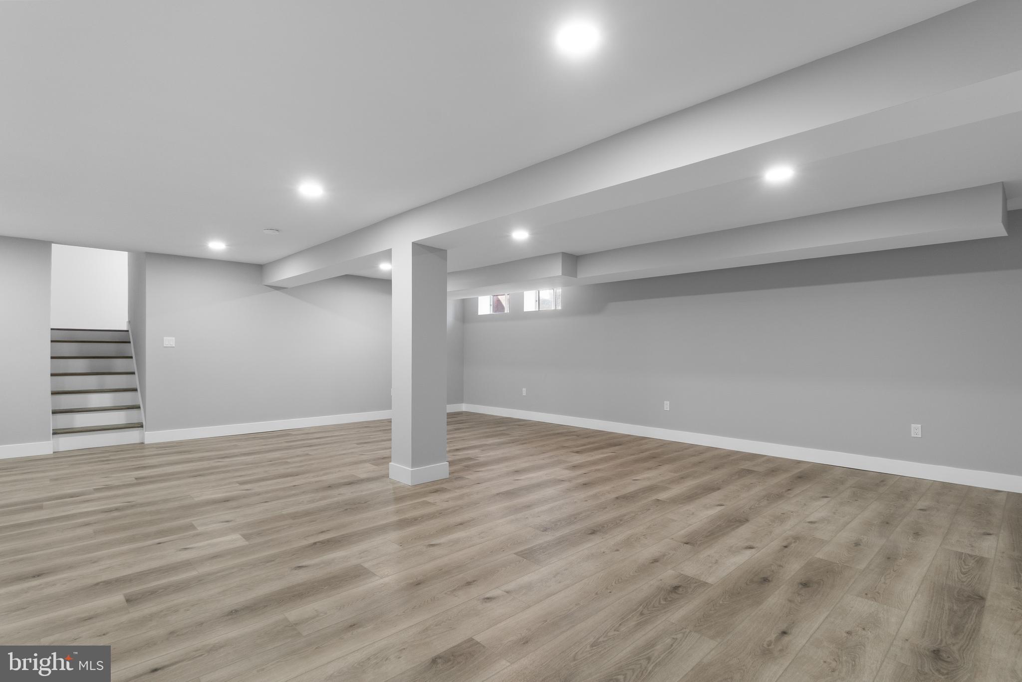 19104 Bloomfield Road Olney, MD 20832 - Photo 31 of 37 a view of an empty room with wooden floor