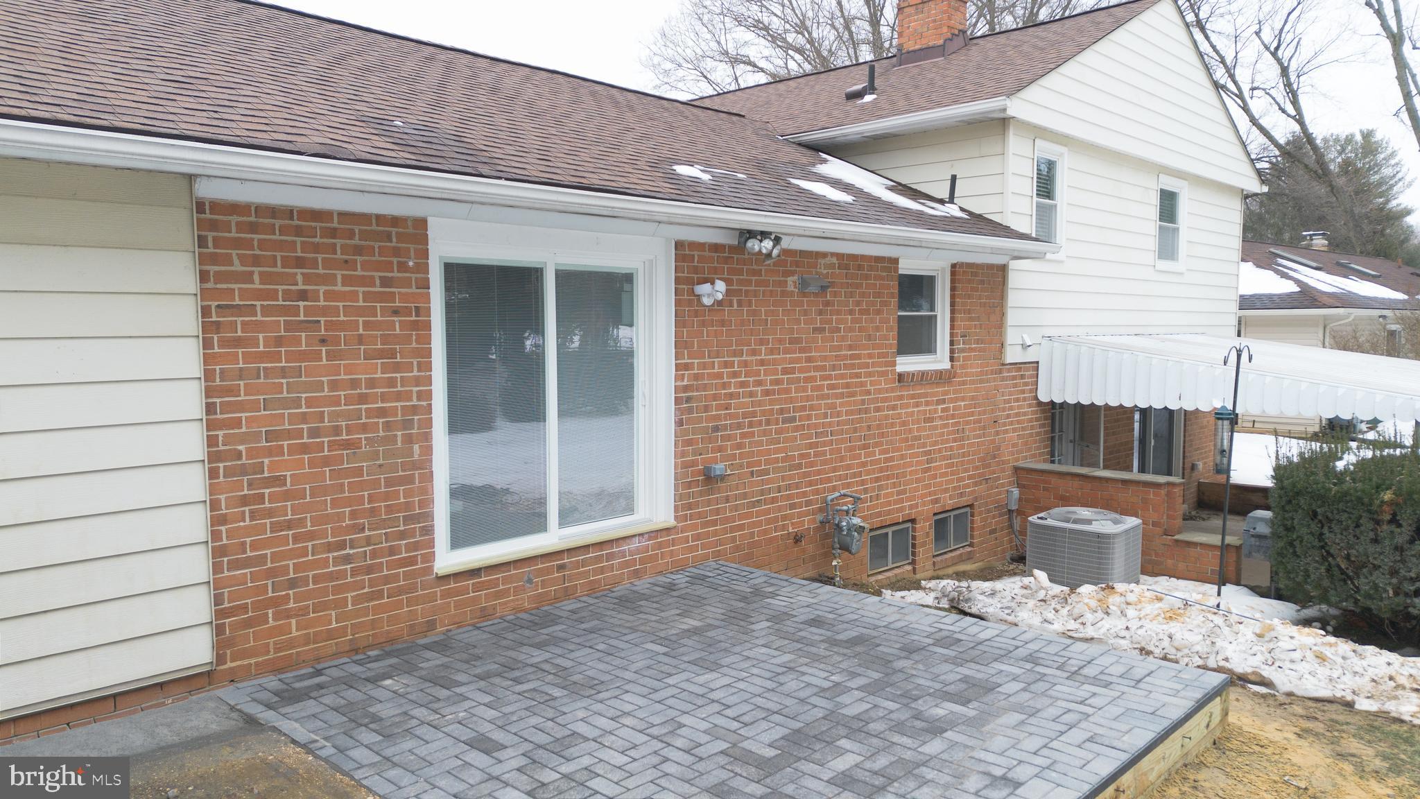19104 Bloomfield Road Olney, MD 20832 - Photo 35 of 37 a backyard of a house with seating space