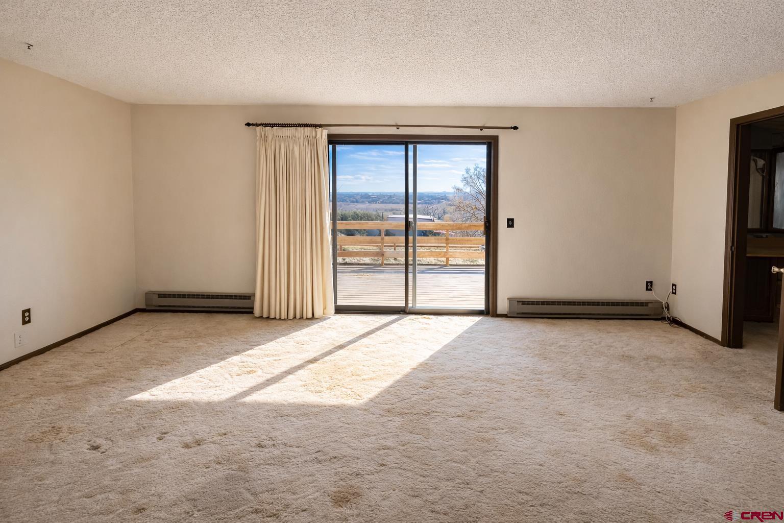 2323 Pioneer Road Delta, CO 81416 - Photo 16 of 35 an empty room with windows