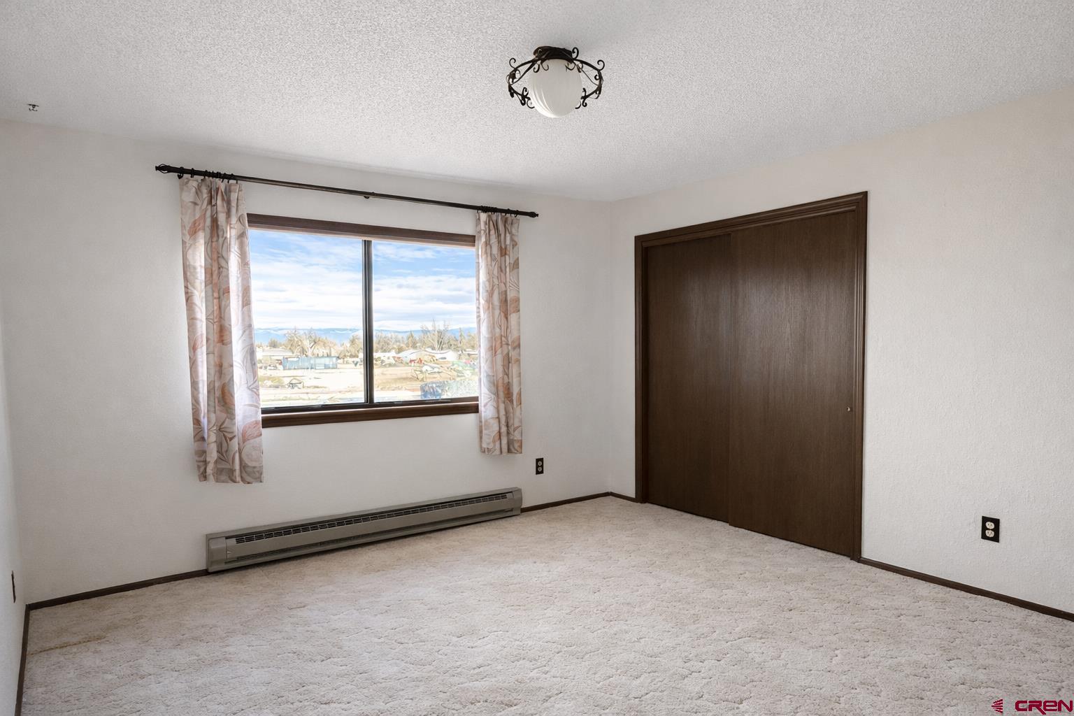 2323 Pioneer Road Delta, CO 81416 - Photo 20 of 35 an empty room with windows
