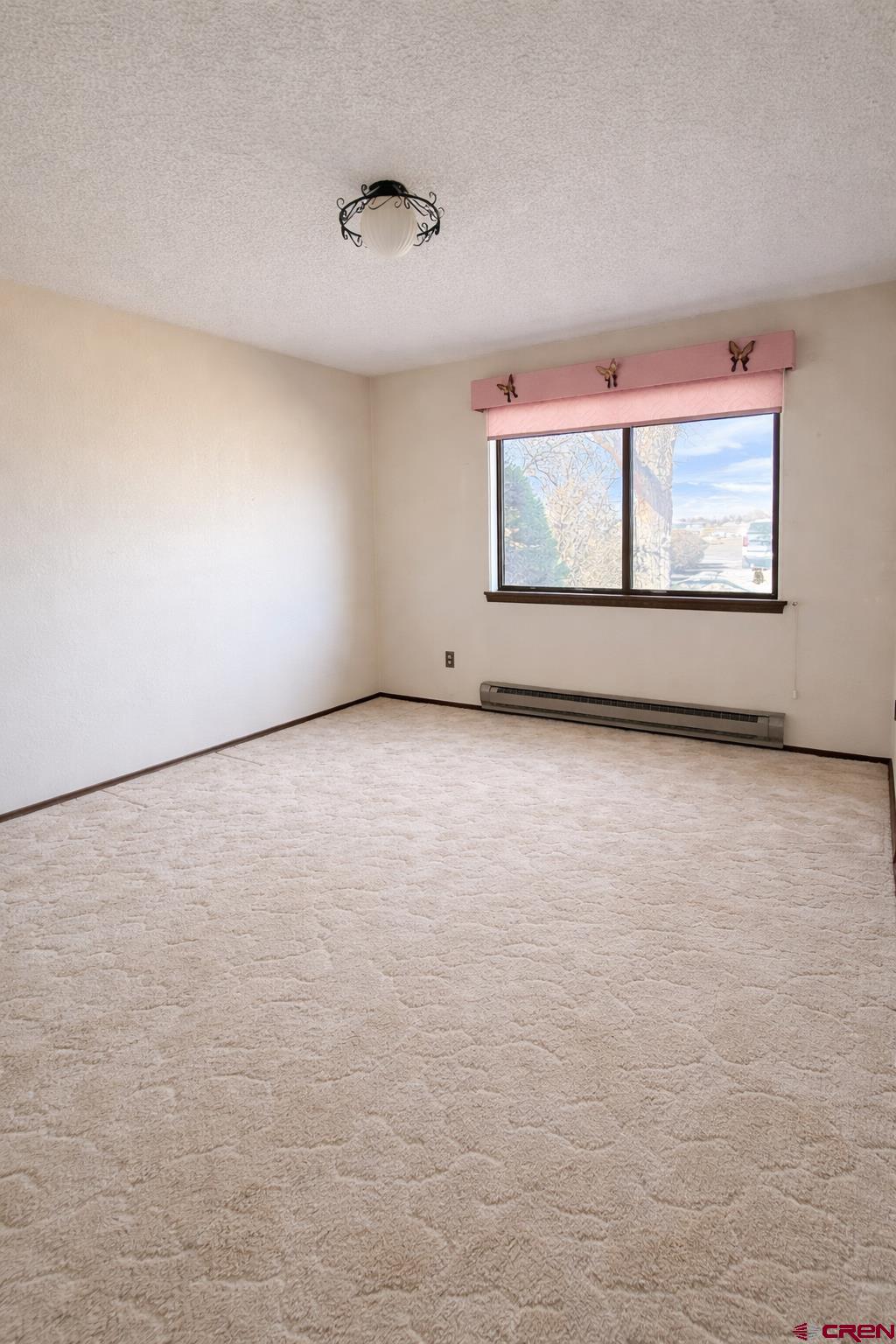 2323 Pioneer Road Delta, CO 81416 - Photo 22 of 35 a view of an empty room with window