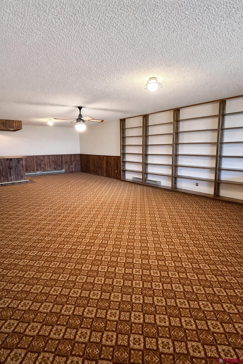2323 Pioneer Road Delta, CO 81416 - Photo 23 of 35 a view of a room with an empty space and wooden floor