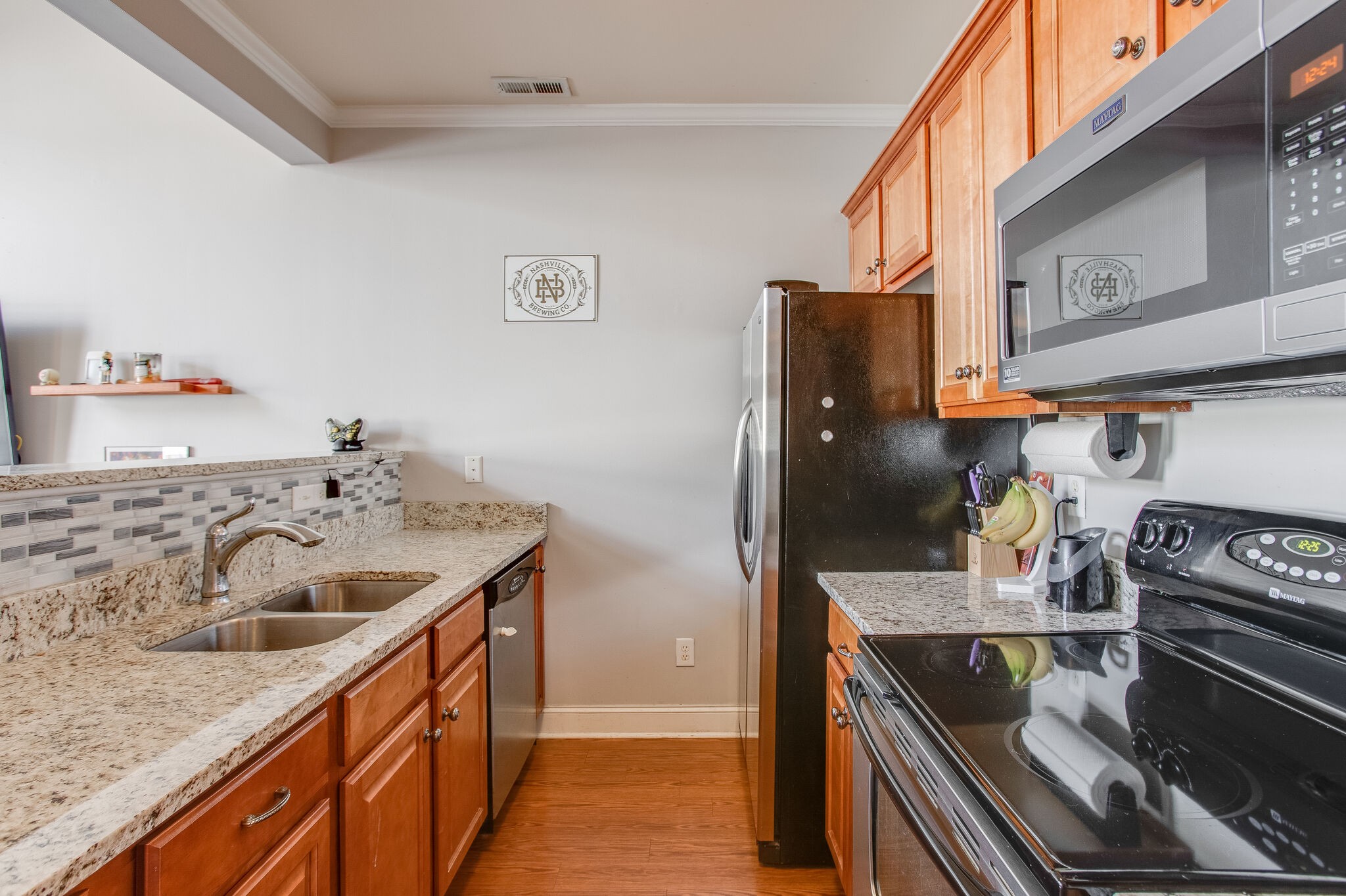 2010 Birch Lane Spring Hill, TN 37174 - Photo 13 of 25 a kitchen with a sink and a stove top oven