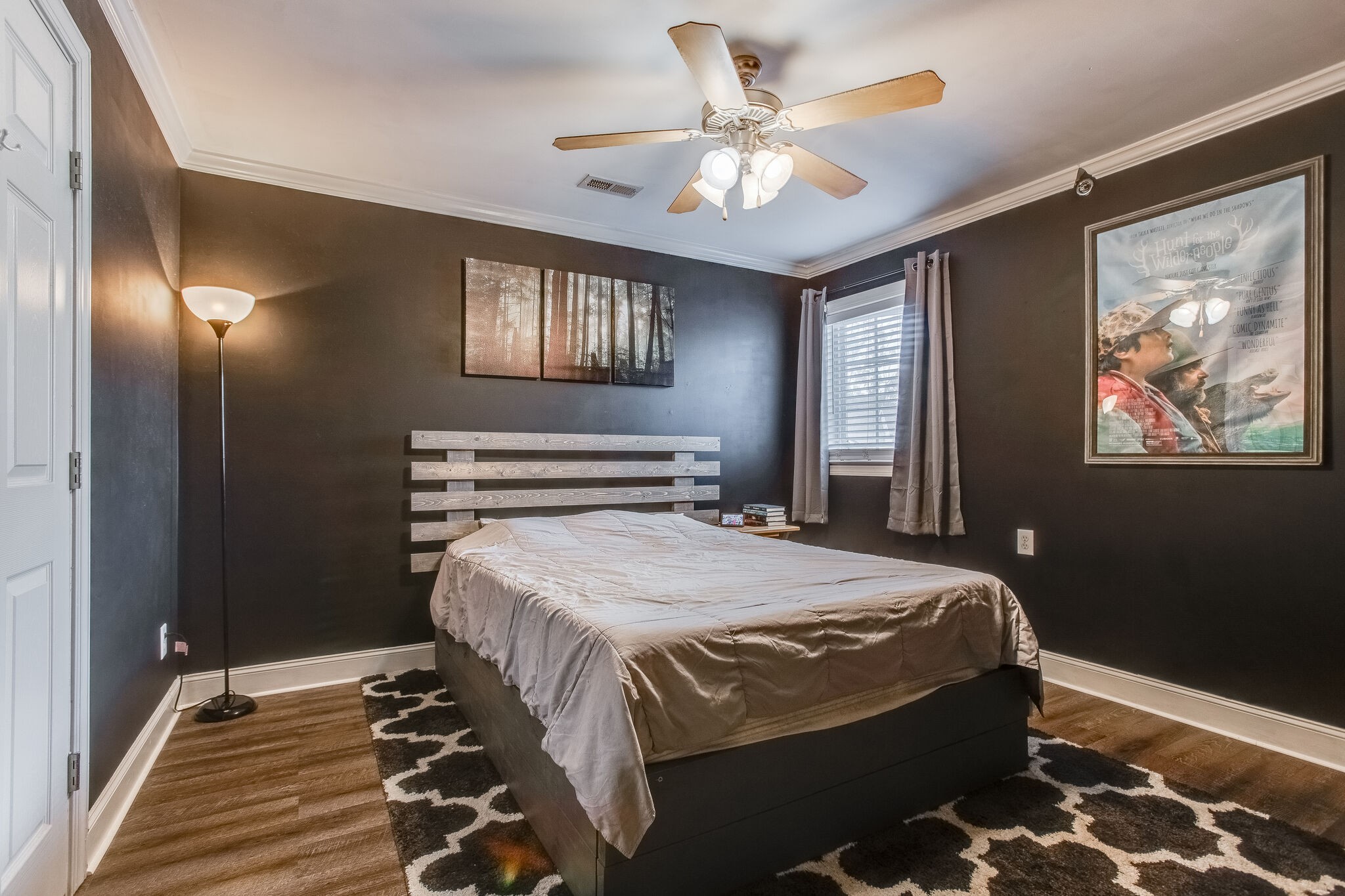 2010 Birch Lane Spring Hill, TN 37174 - Photo 18 of 25 a bedroom with a large bed and a chandelier