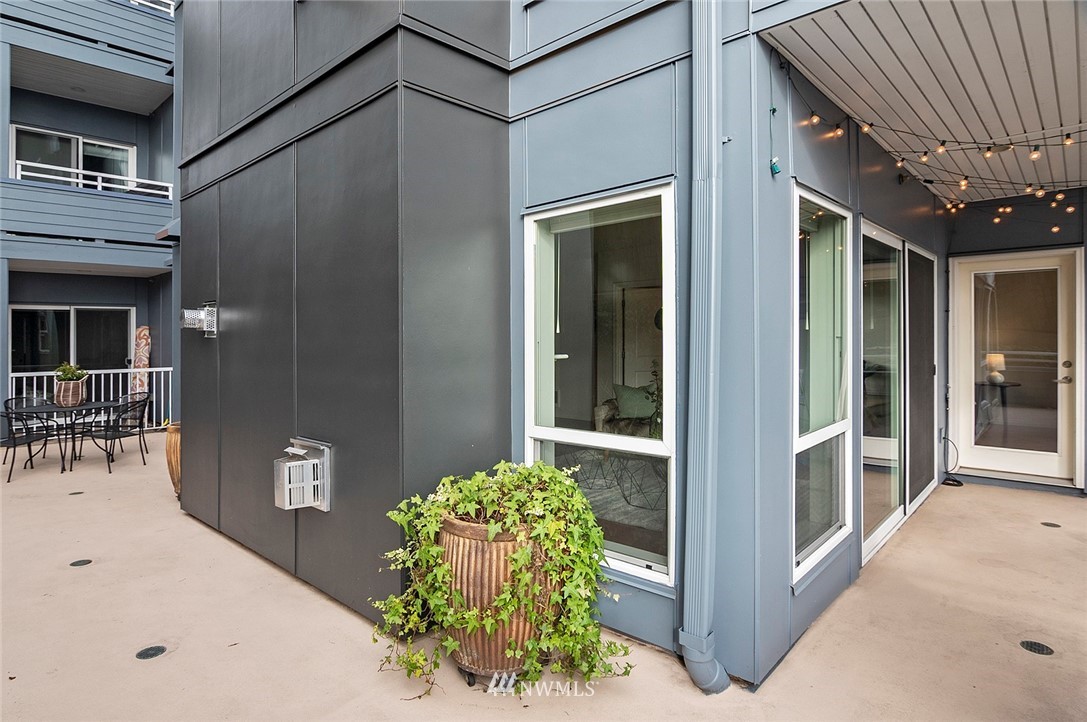 3112 Southwest Avalon Way, Unit 102 Seattle, WA 98126 - Photo 17 of 26 a view of a entryway door of the house