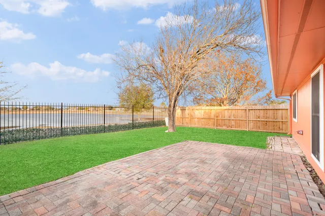 a view of a backyard with a garden