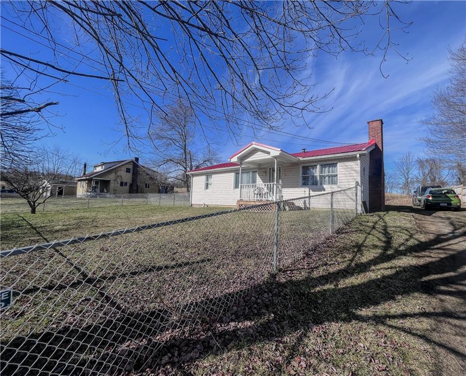 116 Pershing Drive Connellsville, PA 15425 - Photo 24 of 24 a backyard of a house with lots of green space