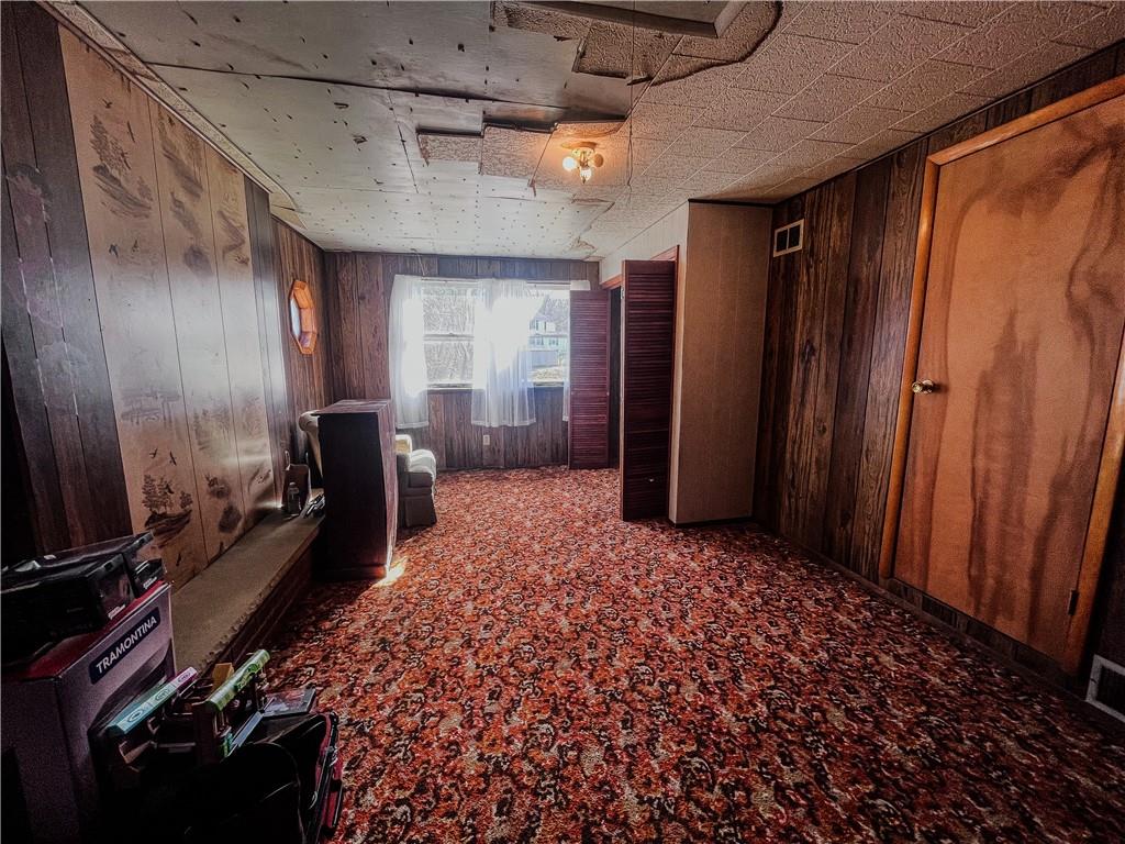 116 Pershing Drive Connellsville, PA 15425 - Photo 6 of 24 a view of hallway with couch