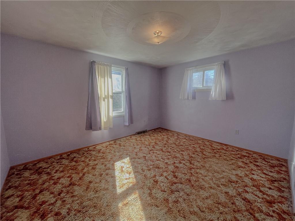 116 Pershing Drive Connellsville, PA 15425 - Photo 10 of 24 a view of empty room with wooden floor