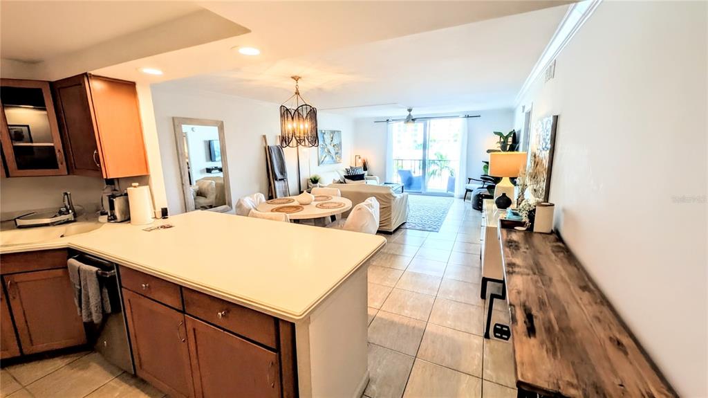 101 South Gulfstream Avenue, Unit 7E Sarasota, FL 34236 - Photo 4 of 40 a very nice looking room with a large window and couch