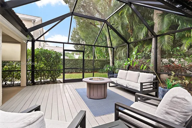 a living room with a couch and iron floor