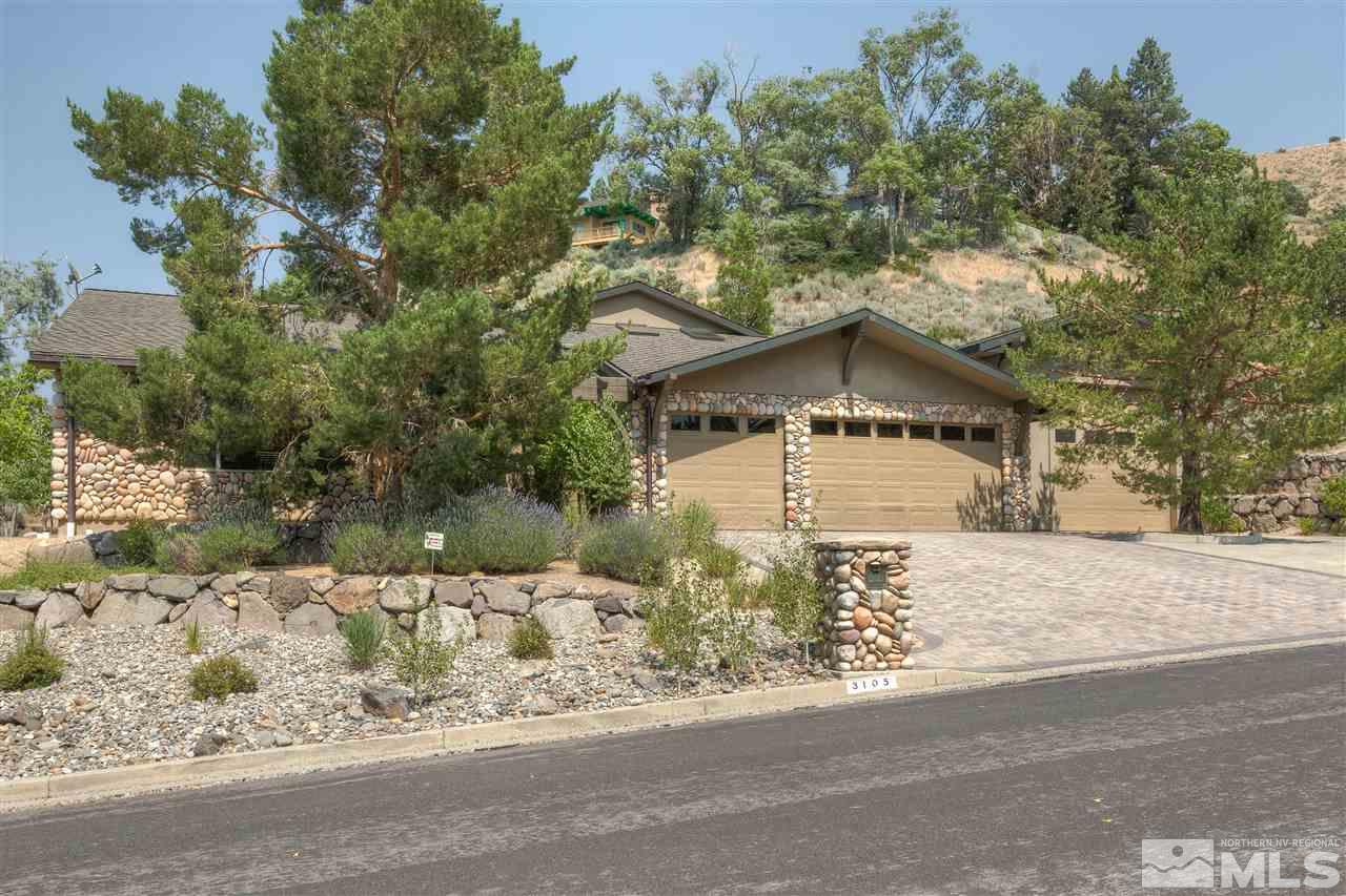 3105 Homewood Drive Reno, NV 89509 - Photo 1 of 1 a front view of a house with a yard covered with snow