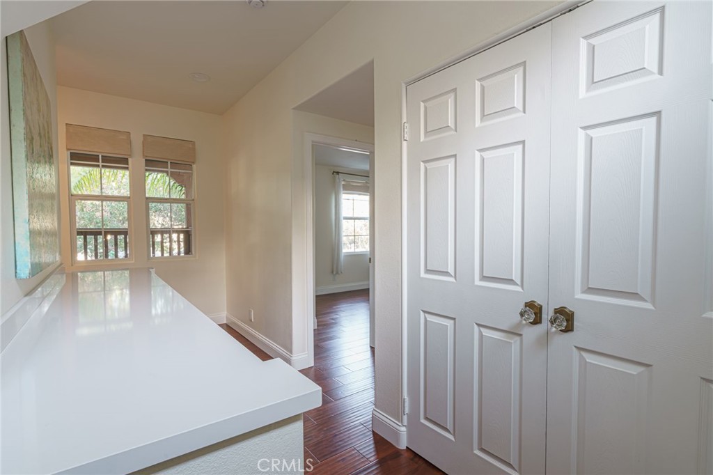 17 Oatfield Farm Ladera Ranch, CA 92694 - Photo 27 of 57 Landing at the top of the stairs there is the laundry and custom cabinetry in the hallway.
