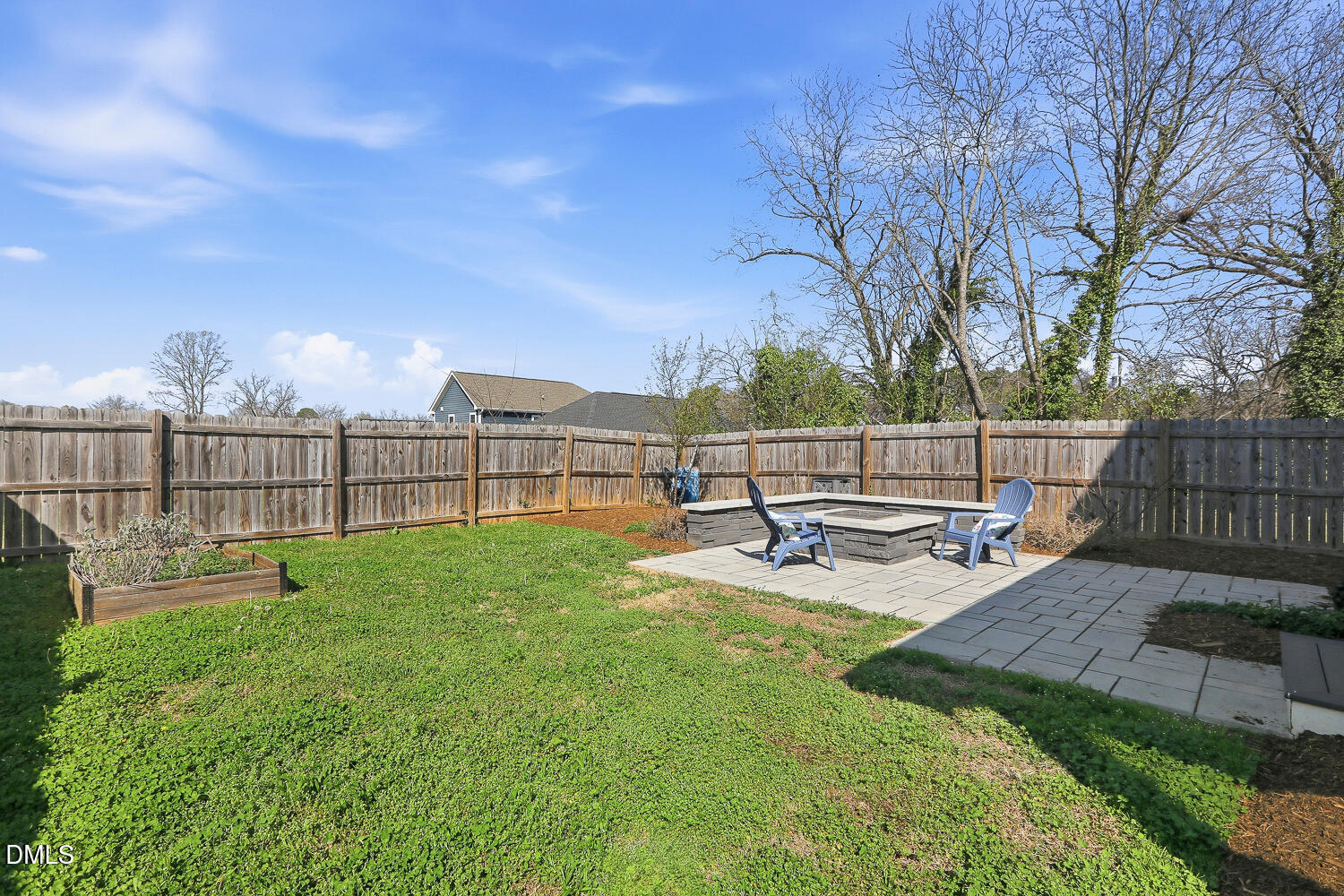 1605 Boyer Street Raleigh, NC 27610 - Photo 34 of 38 a view of a backyard with sitting area