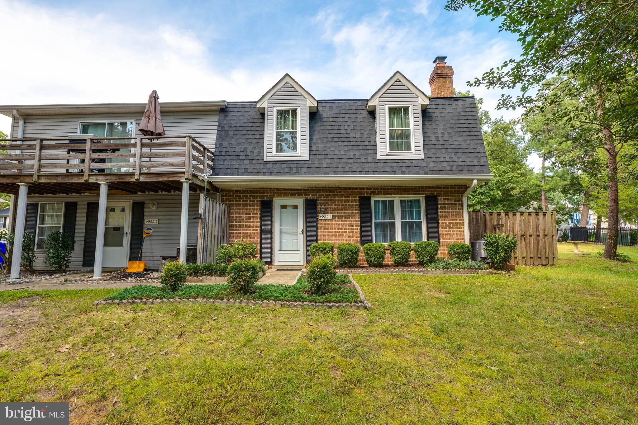 4555 Ryan Place Waldorf, MD 20602 - Photo 1 of 30 a front view of a house with a yard