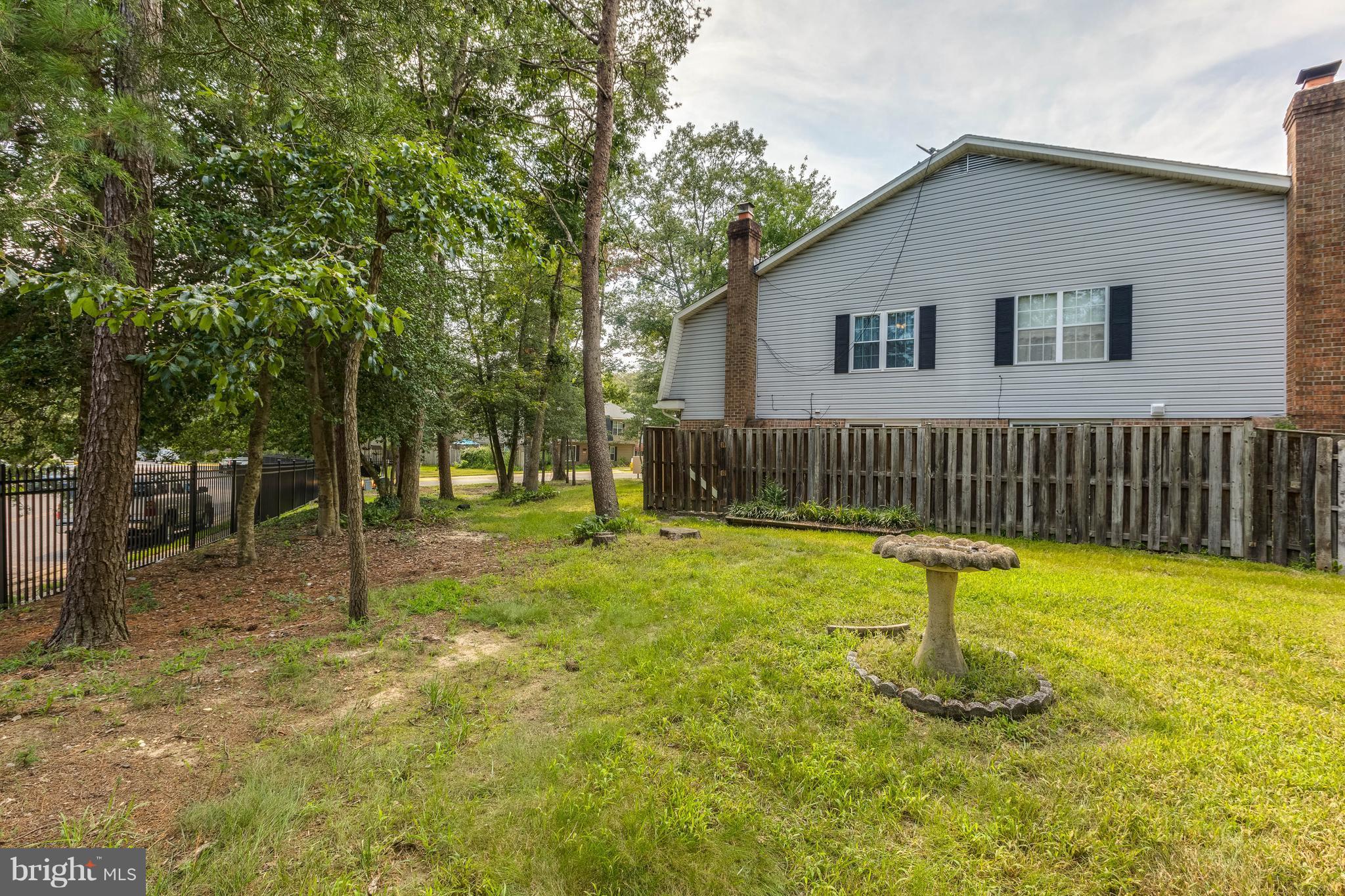 4555 Ryan Place Waldorf, MD 20602 - Photo 24 of 30 a backyard of a house with entertaining space