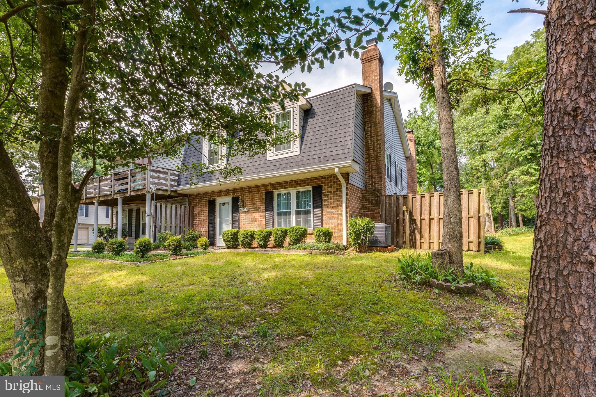 4555 Ryan Place Waldorf, MD 20602 - Photo 30 of 30 a front view of a house with a garden