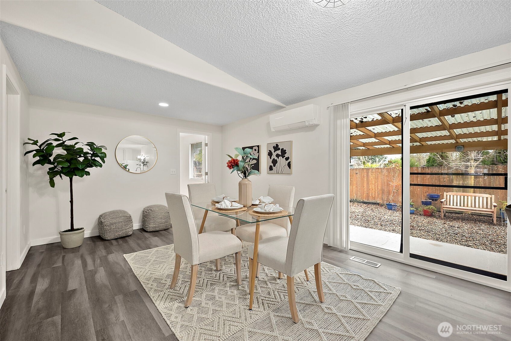 1117 17th Street Southwest Puyallup, WA 98371 - Photo 16 of 40 a view of a dining room with furniture and a large window