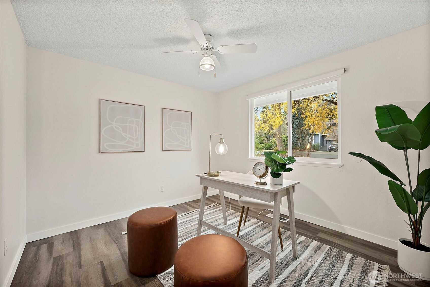 1117 17th Street Southwest Puyallup, WA 98371 - Photo 24 of 40 a living room with furniture and a large window