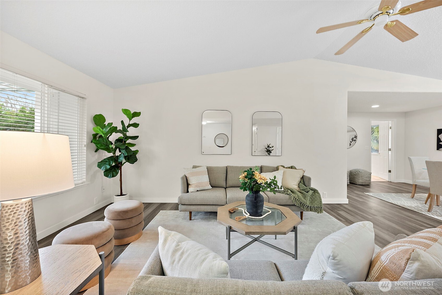 1117 17th Street Southwest Puyallup, WA 98371 - Photo 6 of 40 a living room with furniture potted plant and a window