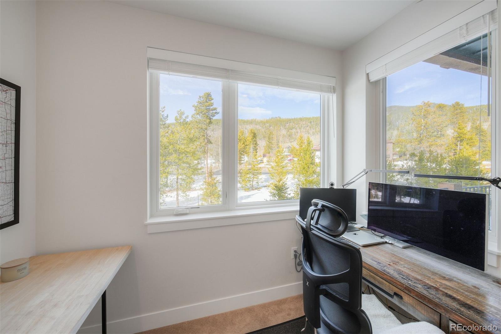111 Clearwater Way, Unit 204 Keystone, CO 80435 - Photo 16 of 35 a workspace with furniture and a window