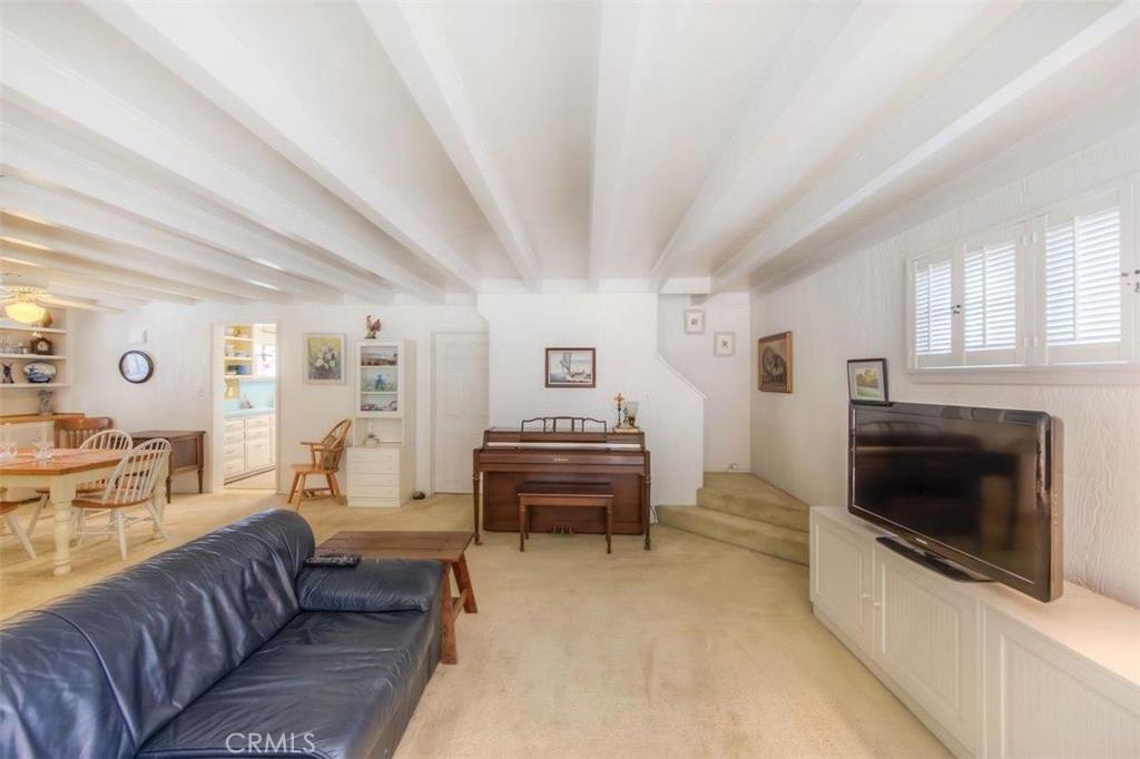 612 South Orange Street Orange, CA 92866 - Photo 11 of 44 a living room with furniture and a fireplace