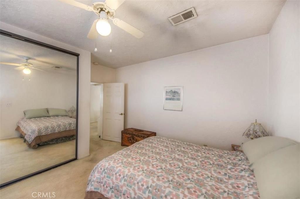 612 South Orange Street Orange, CA 92866 - Photo 13 of 44 a bedroom with a bed and a mirror