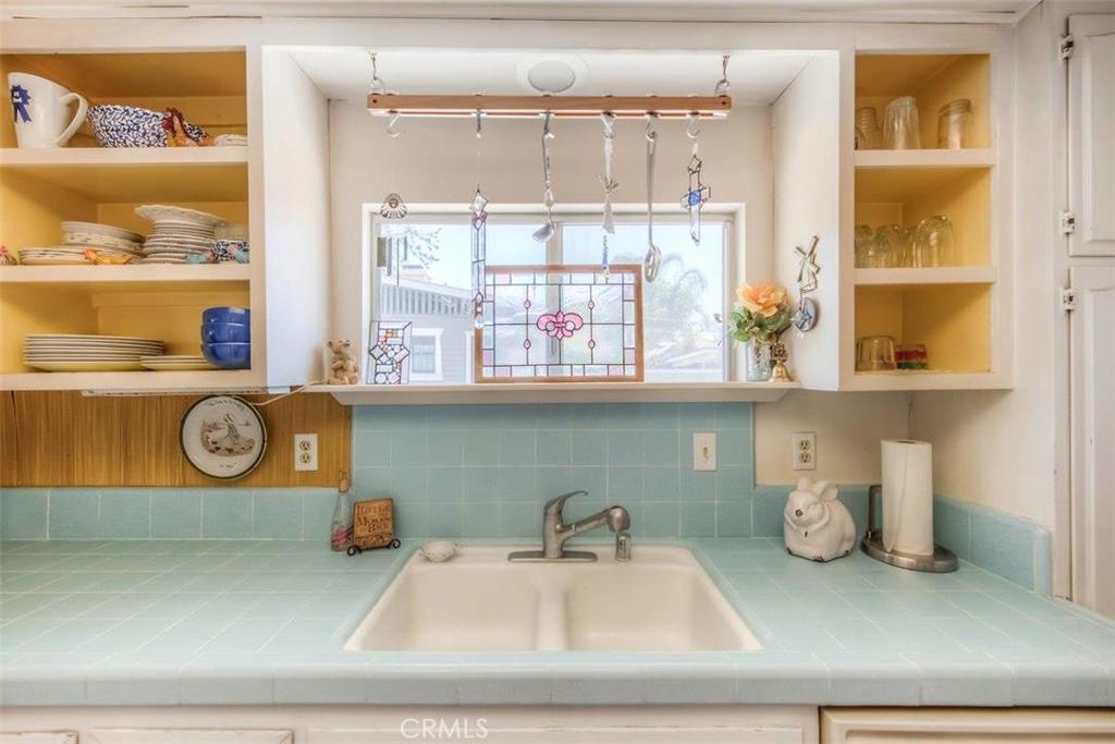 612 South Orange Street Orange, CA 92866 - Photo 20 of 44 a bathroom with a sink a vanity and a window