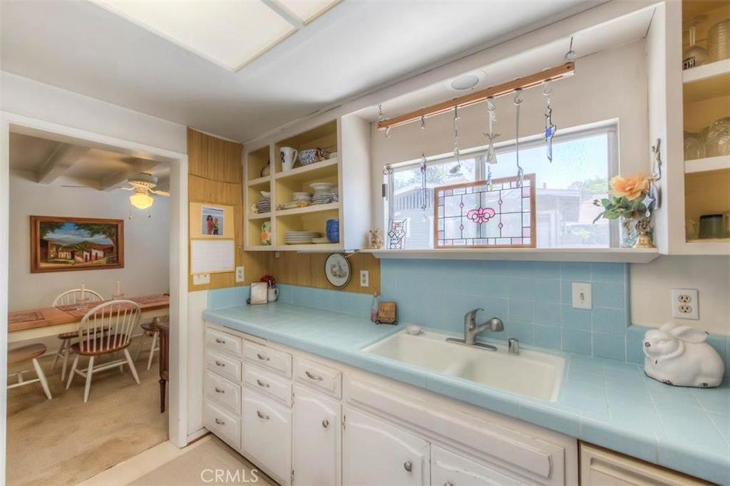 612 South Orange Street Orange, CA 92866 - Photo 21 of 44 a kitchen with stainless steel appliances granite countertop a sink and a cabinets