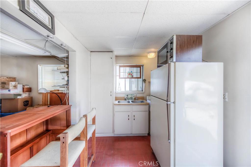 612 South Orange Street Orange, CA 92866 - Photo 38 of 44 a kitchen with stainless steel appliances a refrigerator and a stove