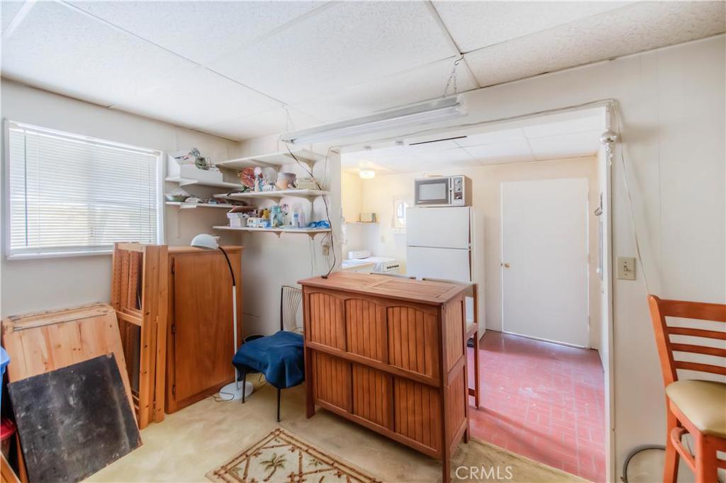 612 South Orange Street Orange, CA 92866 - Photo 40 of 44 a view of kitchen with furniture and wooden floor