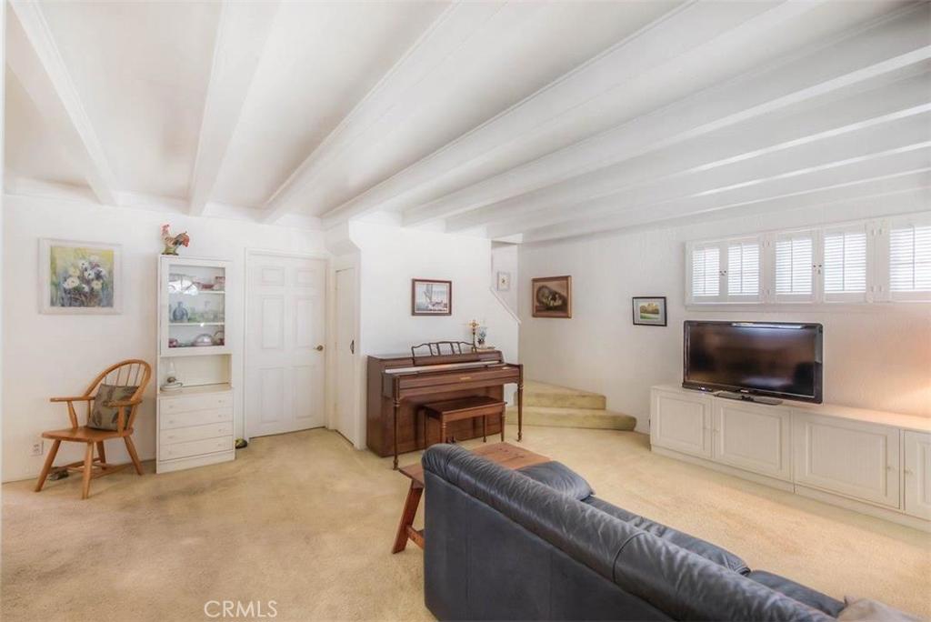 612 South Orange Street Orange, CA 92866 - Photo 5 of 44 a living room with furniture and a flat screen tv