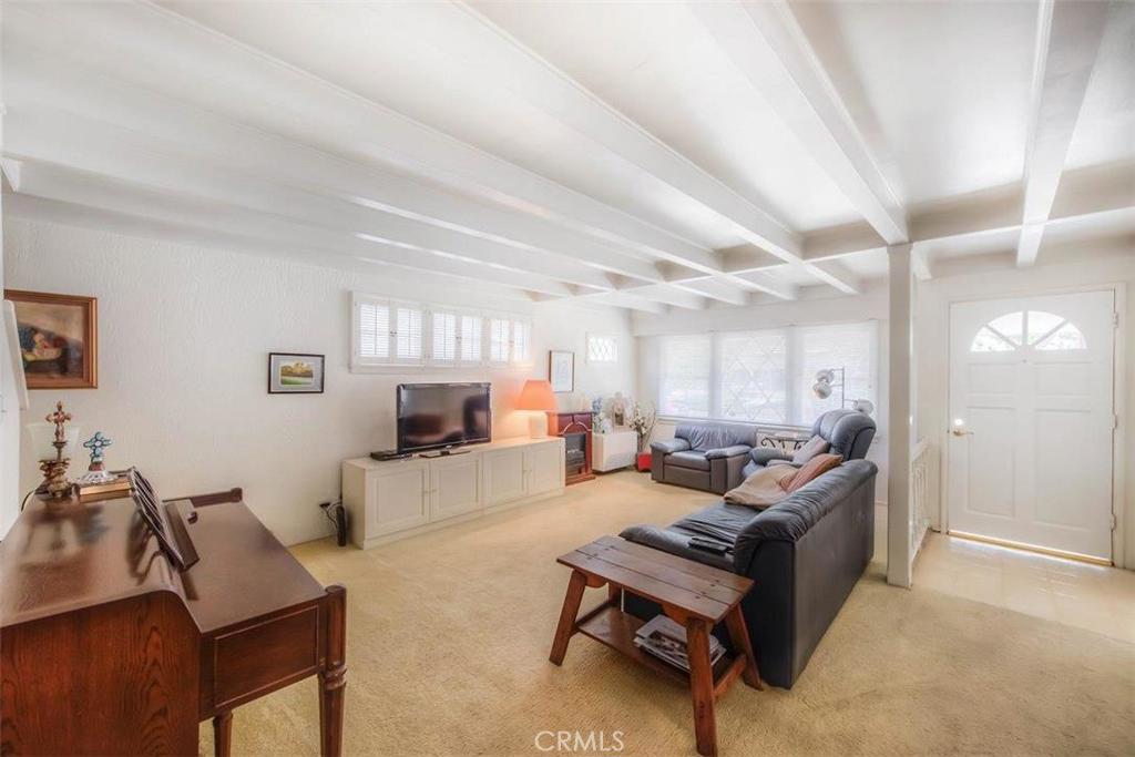 612 South Orange Street Orange, CA 92866 - Photo 9 of 44 a living room with furniture and a wooden floor