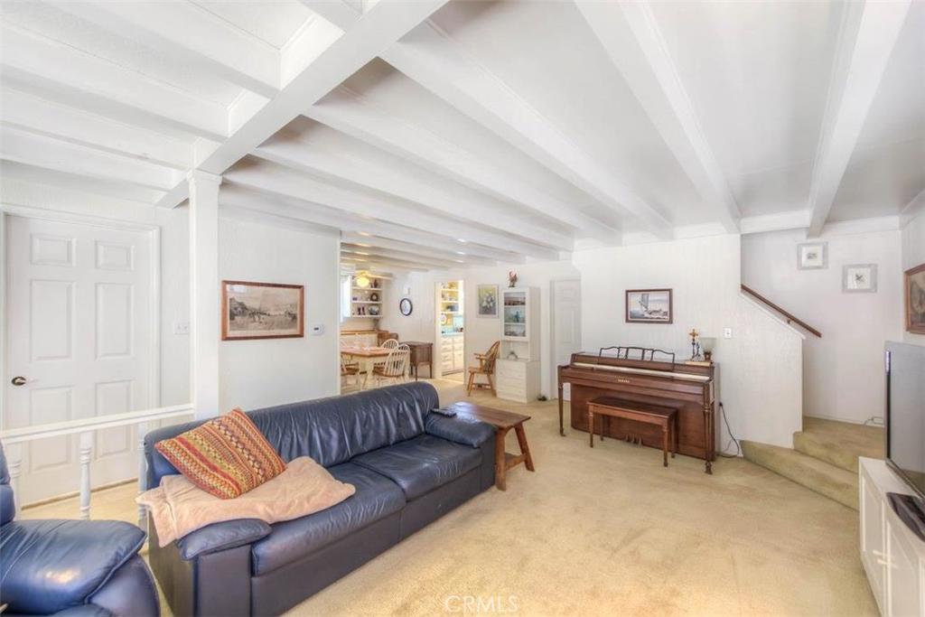 612 South Orange Street Orange, CA 92866 - Photo 10 of 44 a living room with furniture and a piano