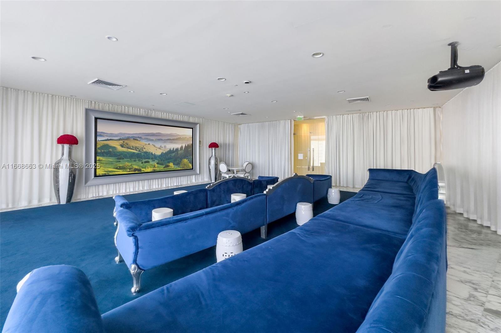 495 Brickell Avenue, Unit 2905 Miami, FL 33131 - Photo 46 of 53 a living room with couches and a flat screen tv