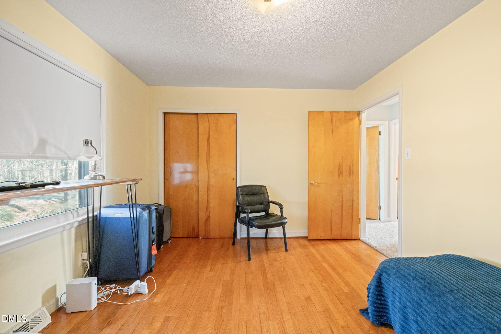 2802 Glover Road Durham, NC 27703 - Photo 19 of 44 a living room with furniture and wooden floor