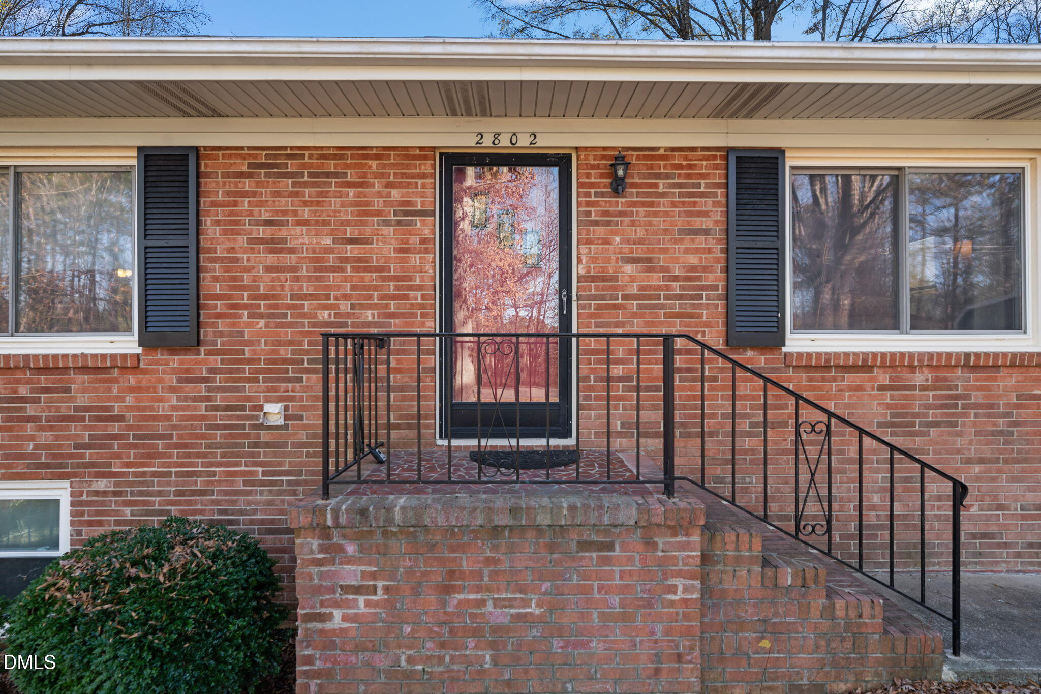 2802 Glover Road Durham, NC 27703 - Photo 3 of 44 a view of a brick house with large windows