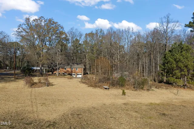 a view of a yard in front of a house