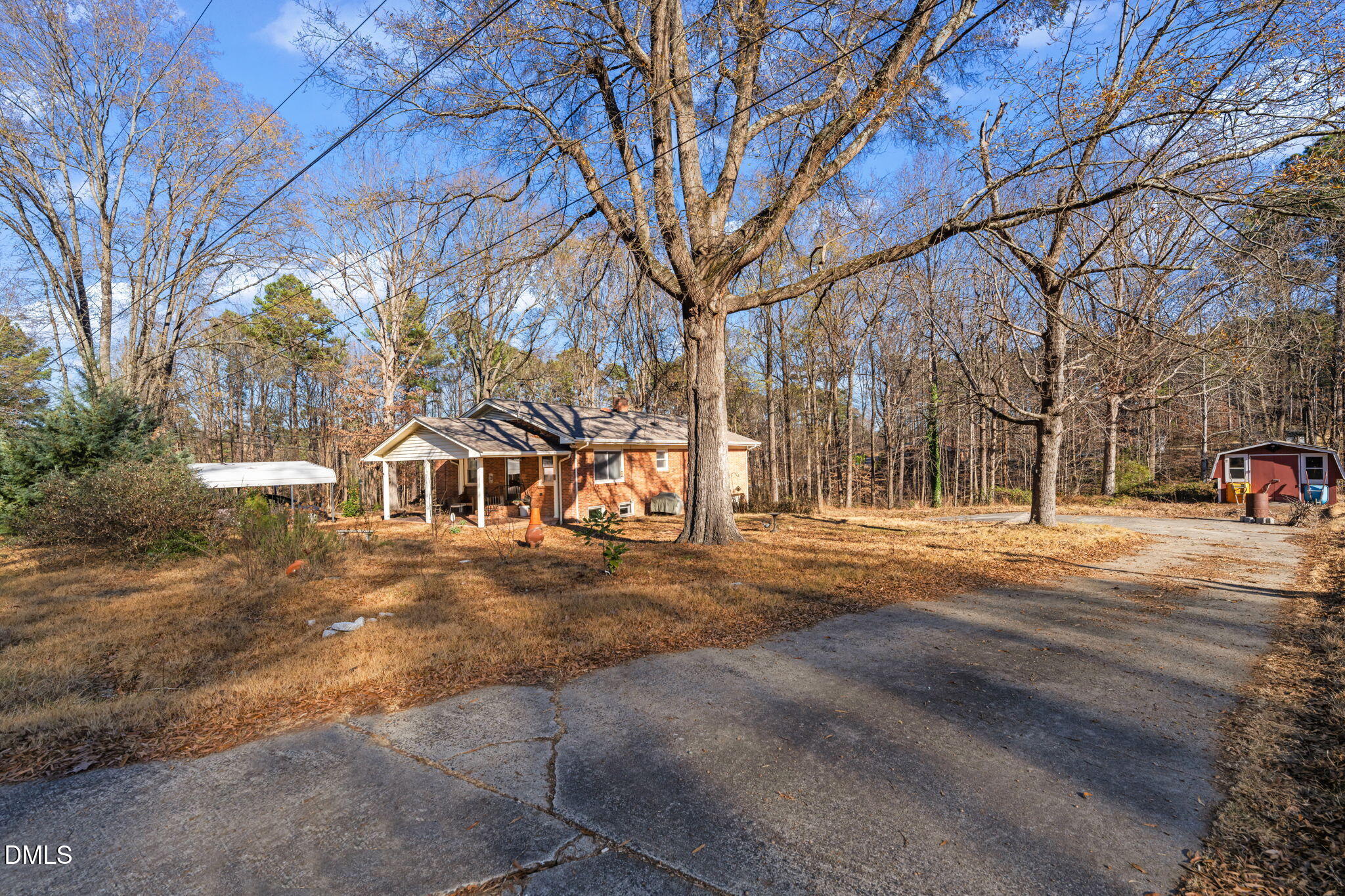 2802 Glover Road Durham, NC 27703 - Photo 39 of 44 a view of road with large trees