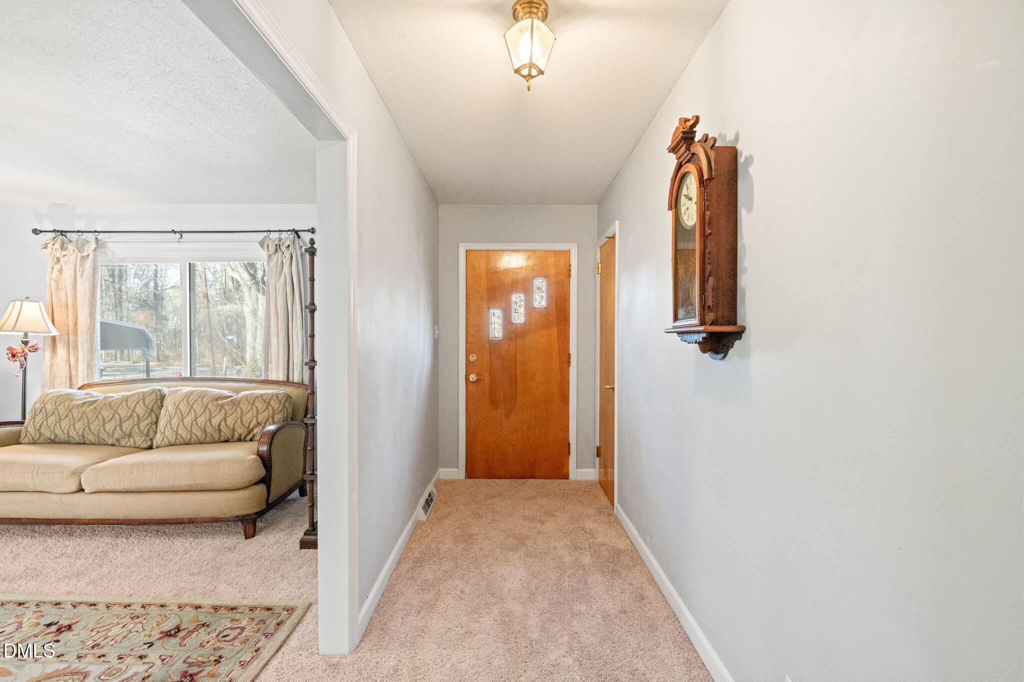 2802 Glover Road Durham, NC 27703 - Photo 4 of 44 a living room with furniture and a window