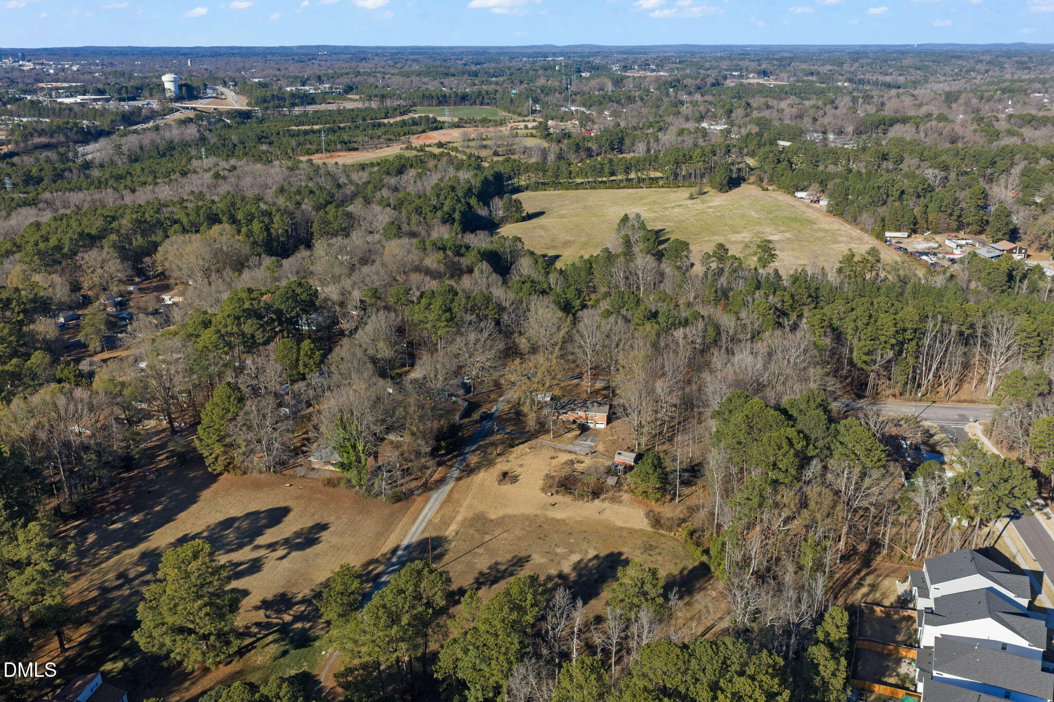 2802 Glover Road Durham, NC 27703 - Photo 43 of 44 an aerial view of mountain with residential house and lake view