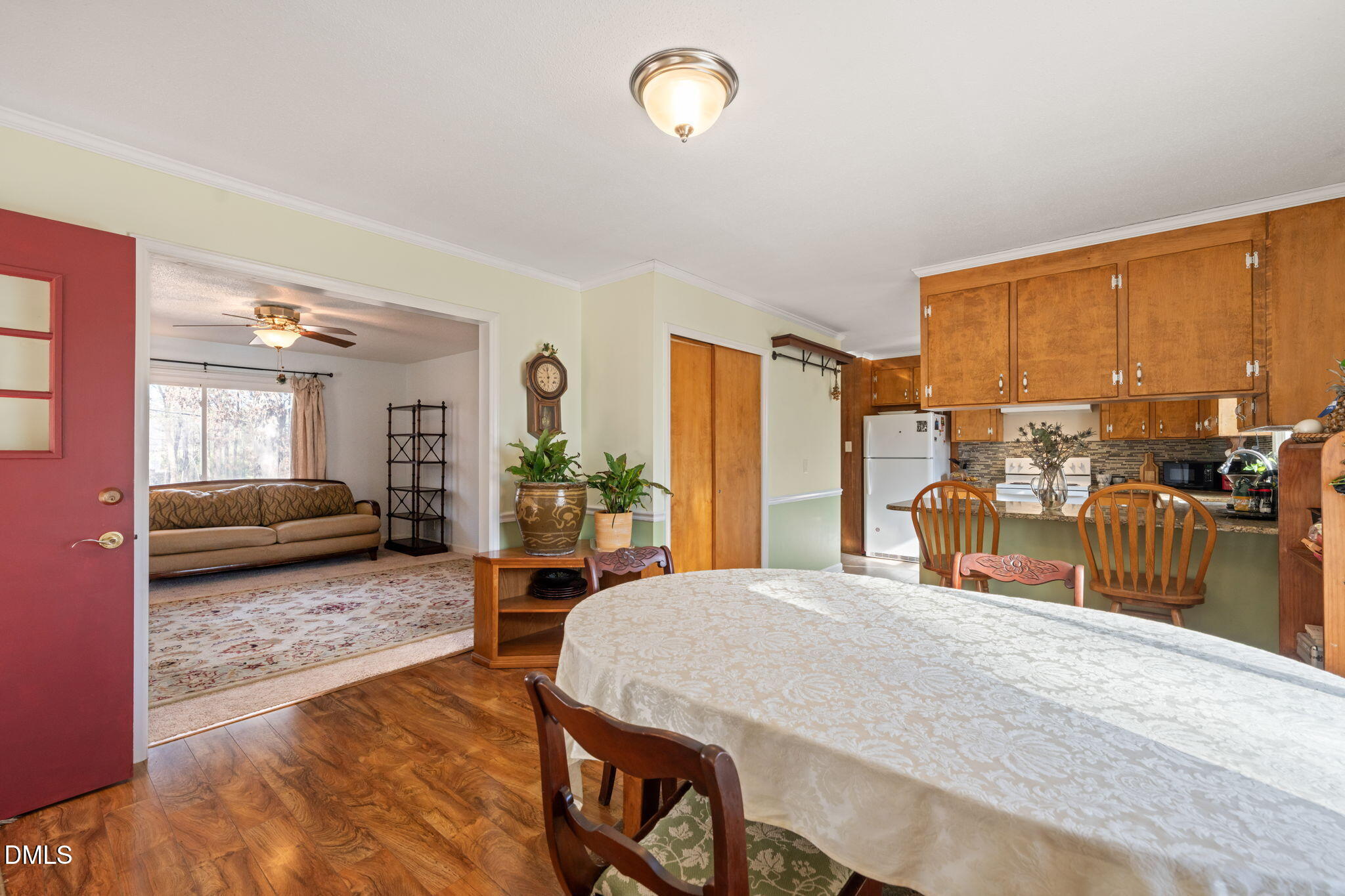 2802 Glover Road Durham, NC 27703 - Photo 8 of 44 a view of a dining room with furniture