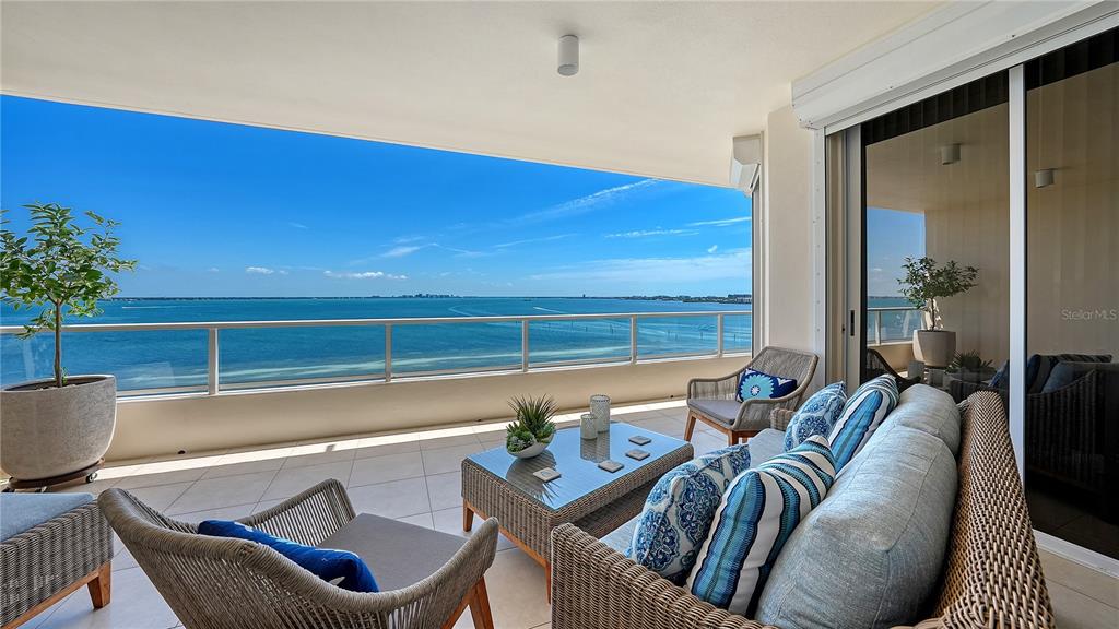 3030 Grand Bay Boulevard, Unit 384 Longboat Key, FL 34228 - Photo 1 of 1 a view of a dining room with furniture window and outside view